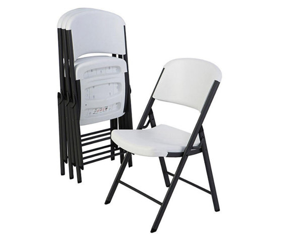 White folding chair with black steel frame